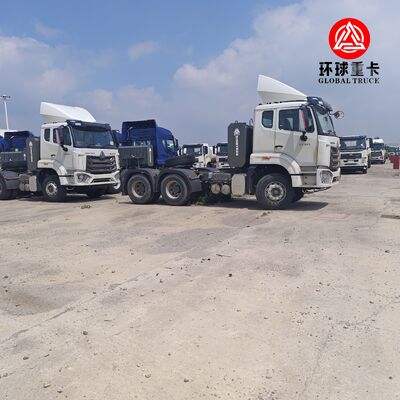 ब्रांड न्यू HOWO NX 6x4 ट्रैक्टर ट्रक 430HP हेवी ड्यूटी लॉजिस्टिक्स के लिए राइट हैंड ड्राइव प्राइम मूवर